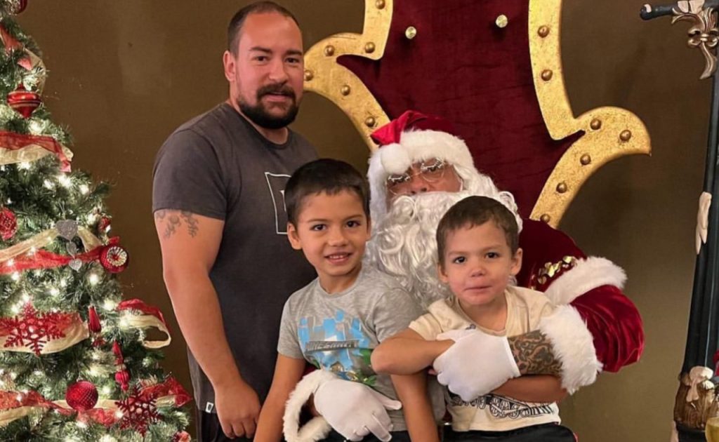 Phil Long Jr. and his sons at Christmas.