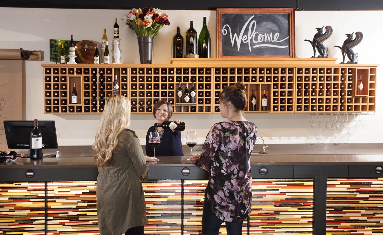 Guests tasting wine inside tasting room at Barnard Griffin winery.