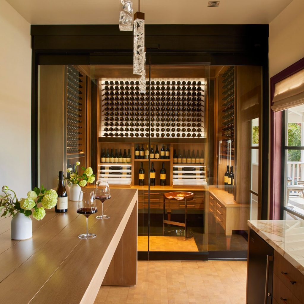 Enter in back at the bottle library, and you’ll see a glass panel in the floor, looking down to the house's ancient root cellar.