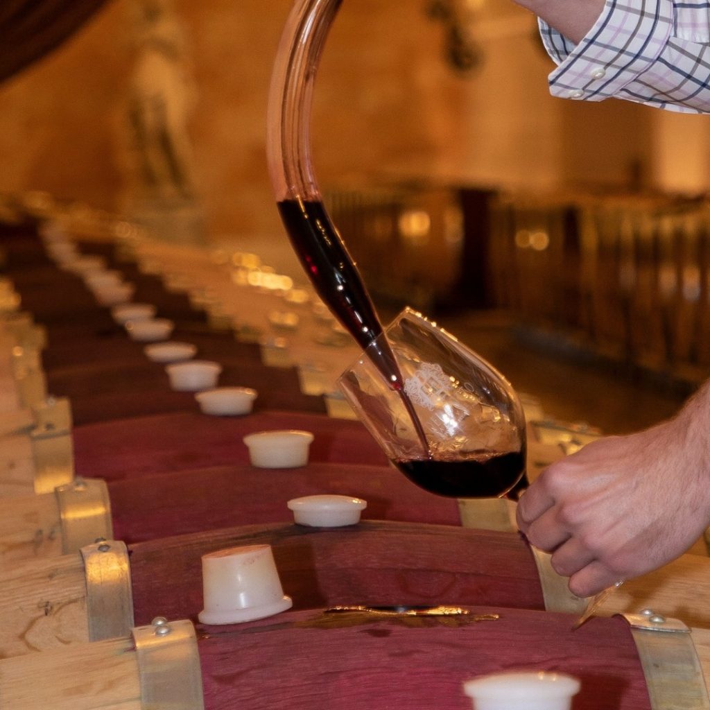 Wine thieving at Del Dotto Vineyards.
