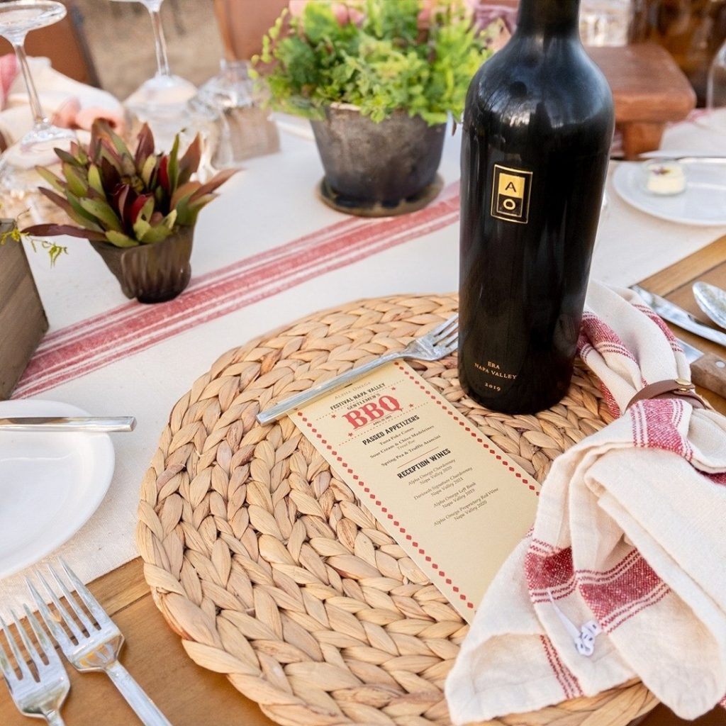 Alpha Omega Winery flagship ERA wine bottle on table.