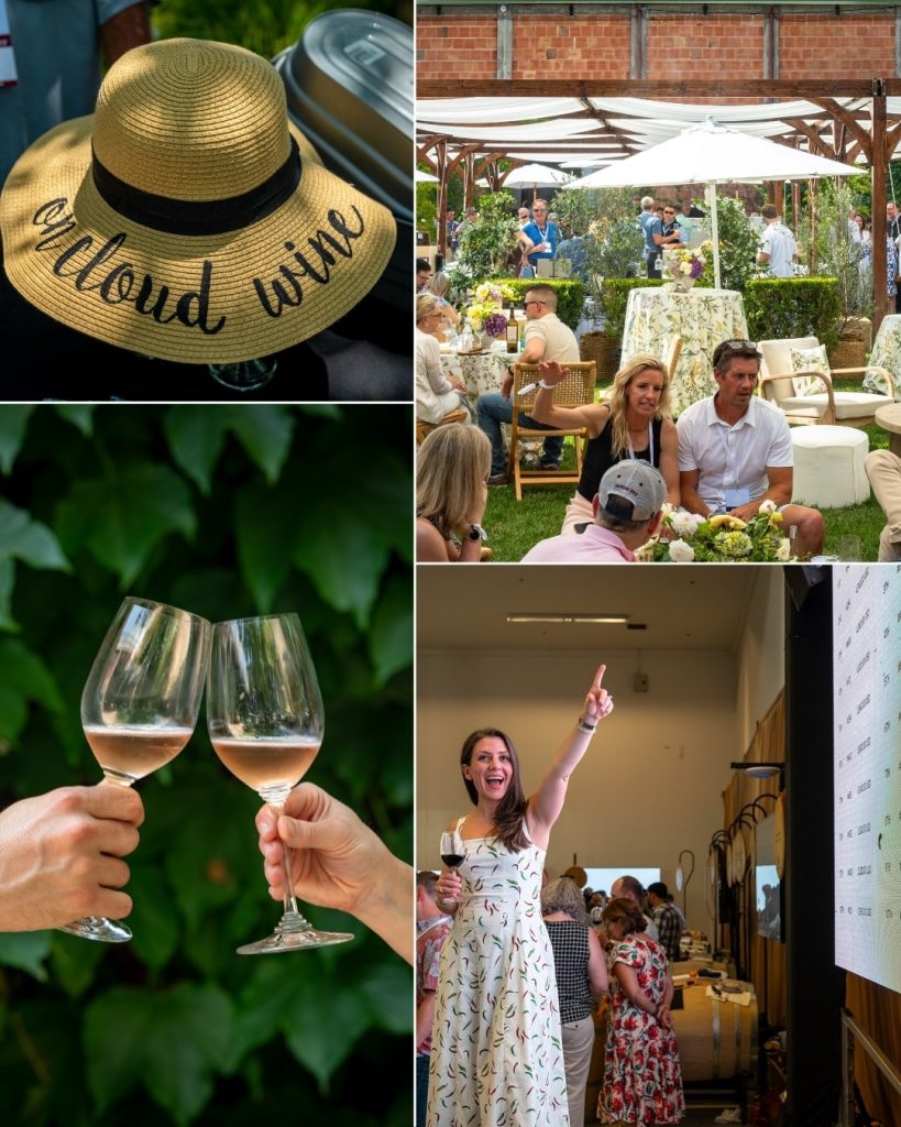 Sun hat, guests talking, two glasses of sparkling wine, auctioneer pointing at screen at Napa Valley Barrel Auction during Auction Napa Valley. 