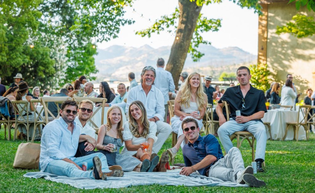 Guests on lawn at Andrea Bocelli concert at Charles Krug Winery in Napa Valley.