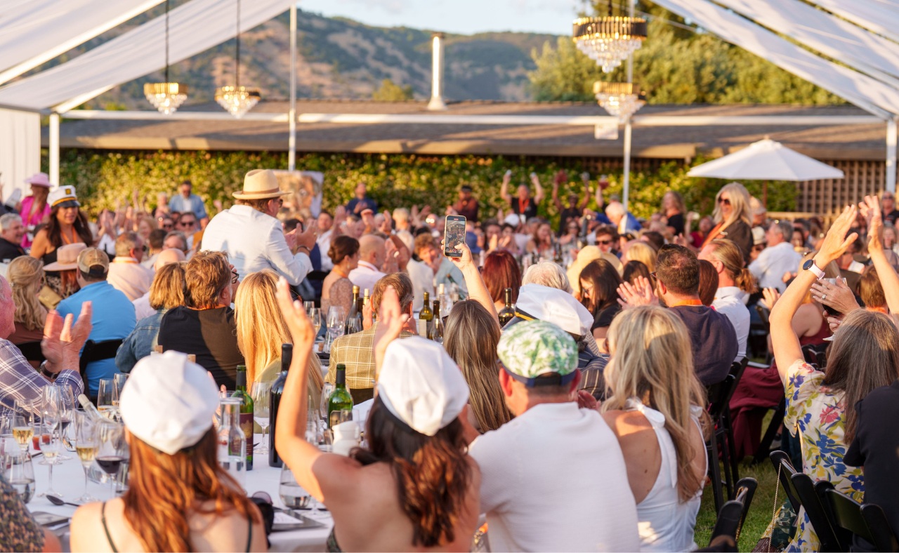 Guests gather at Oakville’s Castellucci Estate for the 12th annual WineaPAWlooza Live Auction.