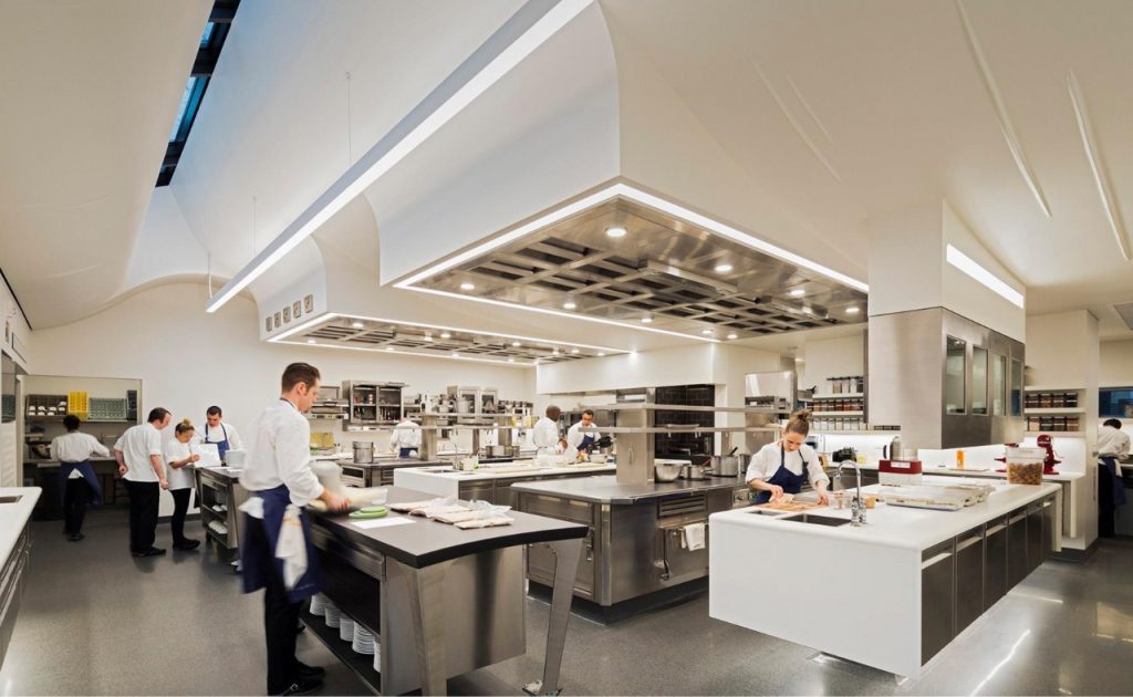 The French Laundry restaurant kitchen with chefs and team members. 