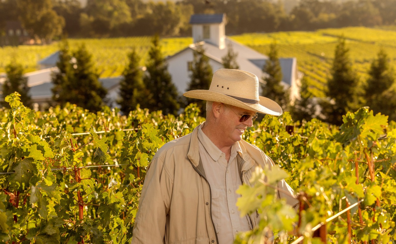 Tom Gamble walking the vineyard at Gamble Estates in Napa.