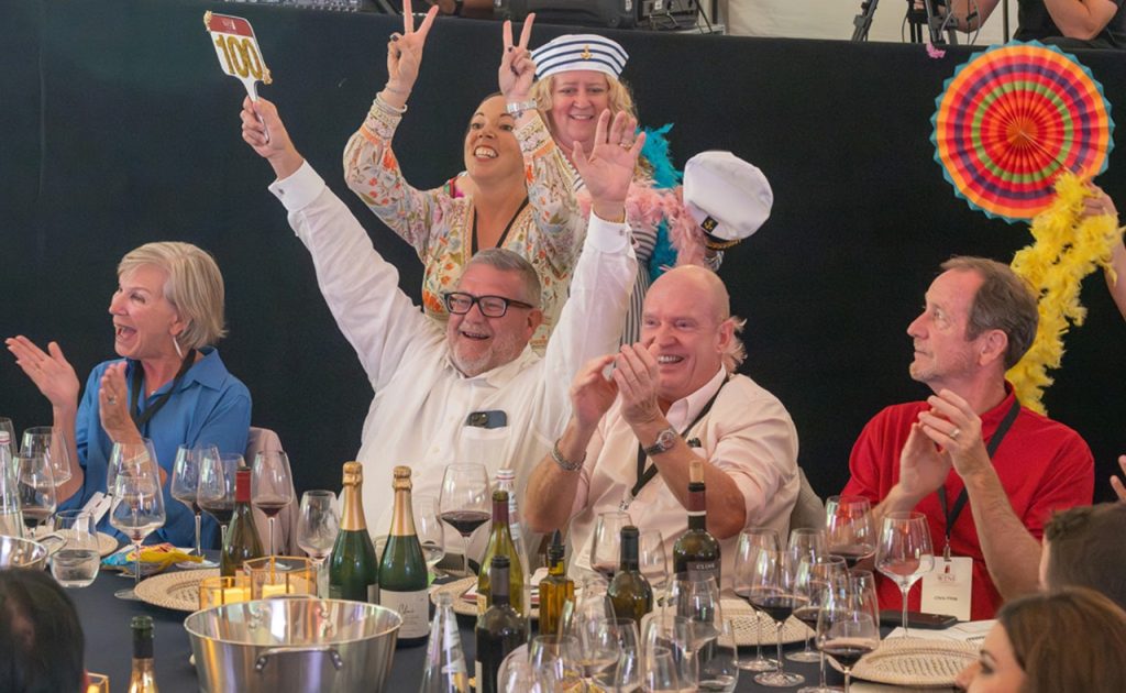 Guest wins auction bid at Sonoma County Wine Celebration.