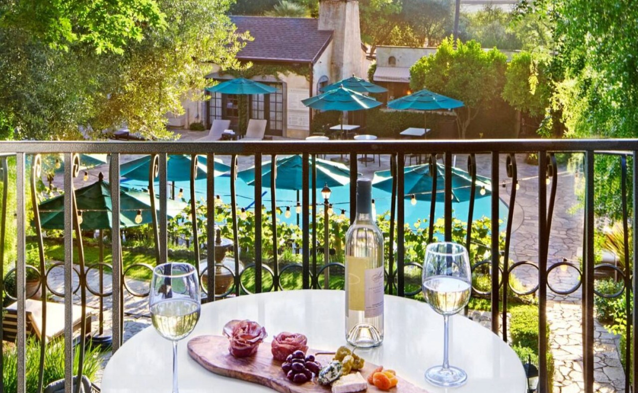 Kenwood Inn & Spa balcony with pool view.