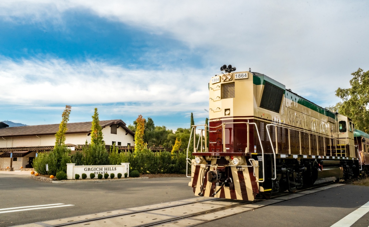 Napa Valley Wine Train passing by Grgich Hills winery.